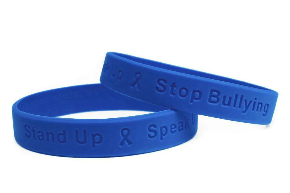 Stand Up - Speak Up - Stop Bullying White Letters Blue Wristband - Youth 7"